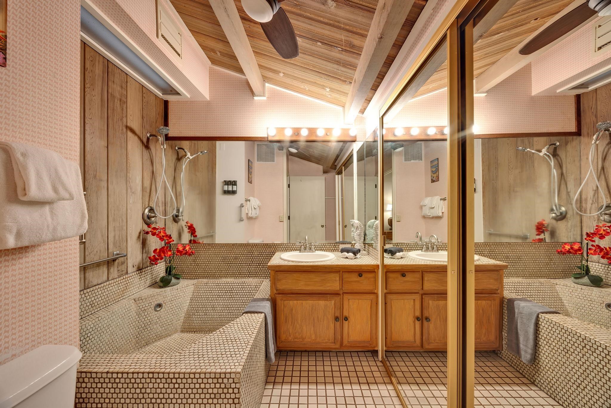 3691 Lower Honoapiilani Road, Unit 211 Lahaina, HI 96761 - Photo 26 of 47 a bathroom with a sink a toilet and shower