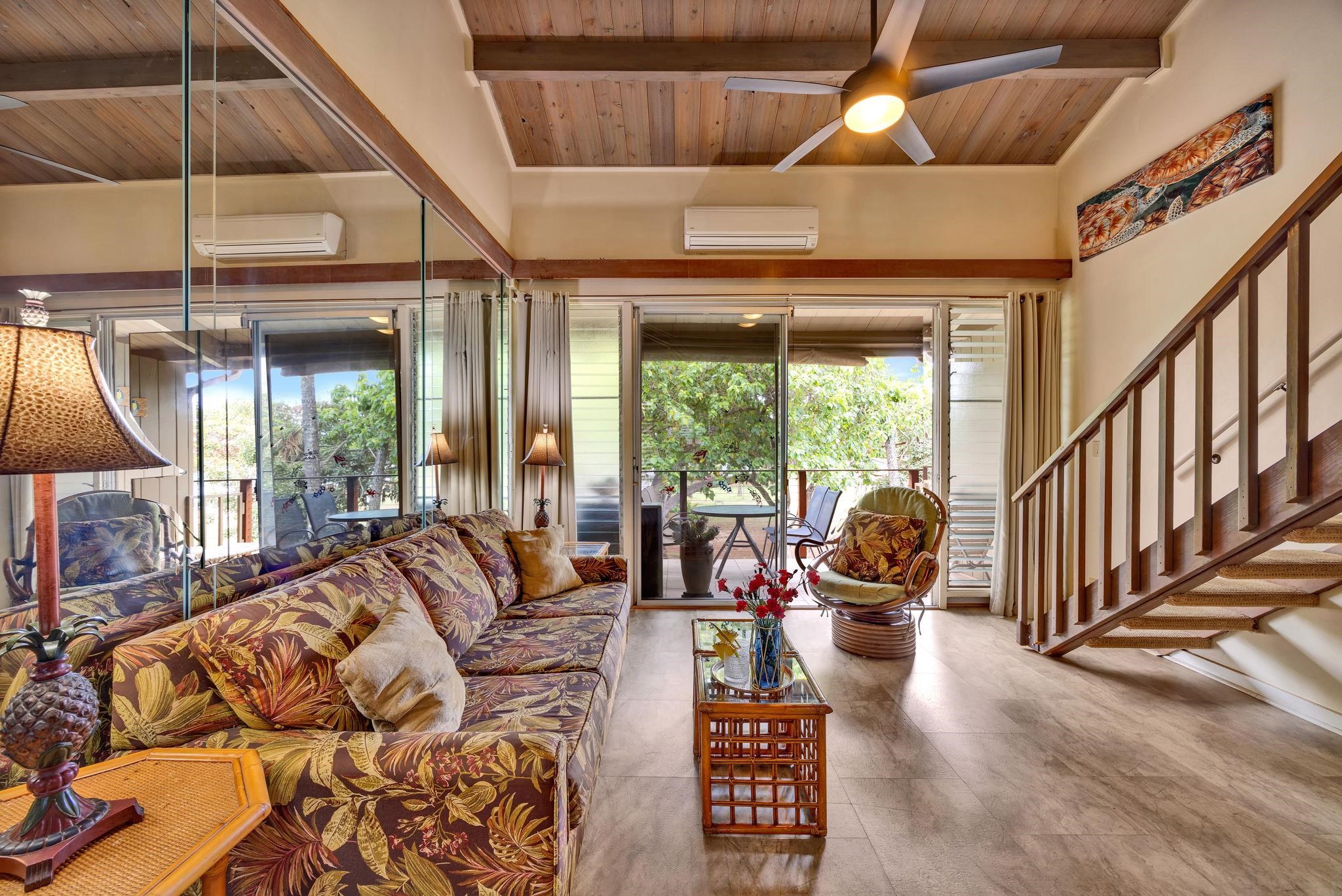 3691 Lower Honoapiilani Road, Unit 211 Lahaina, HI 96761 - Photo 30 of 47 a living room with furniture and a large window