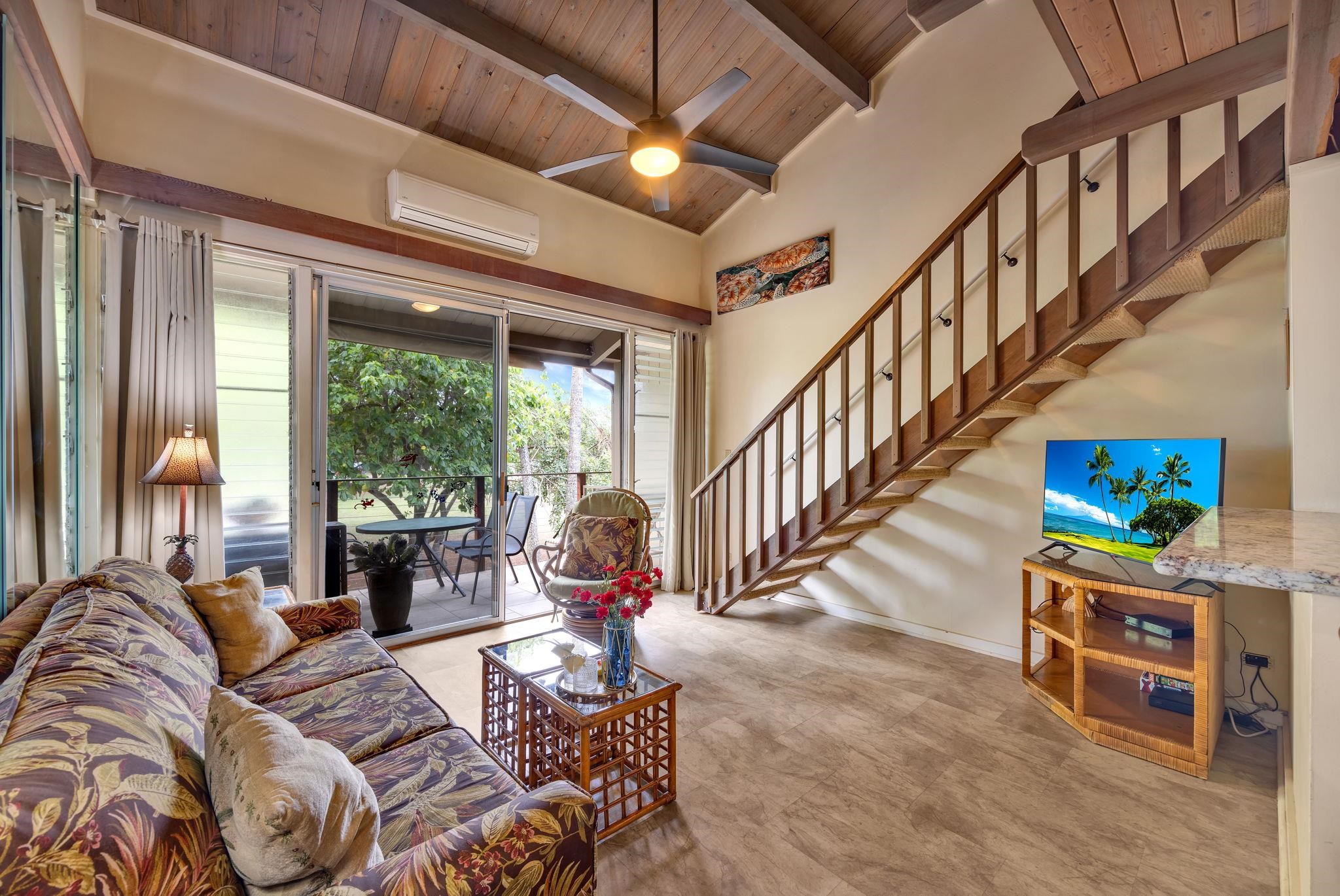 3691 Lower Honoapiilani Road, Unit 211 Lahaina, HI 96761 - Photo 3 of 47 a bed room with furniture and a chandelier