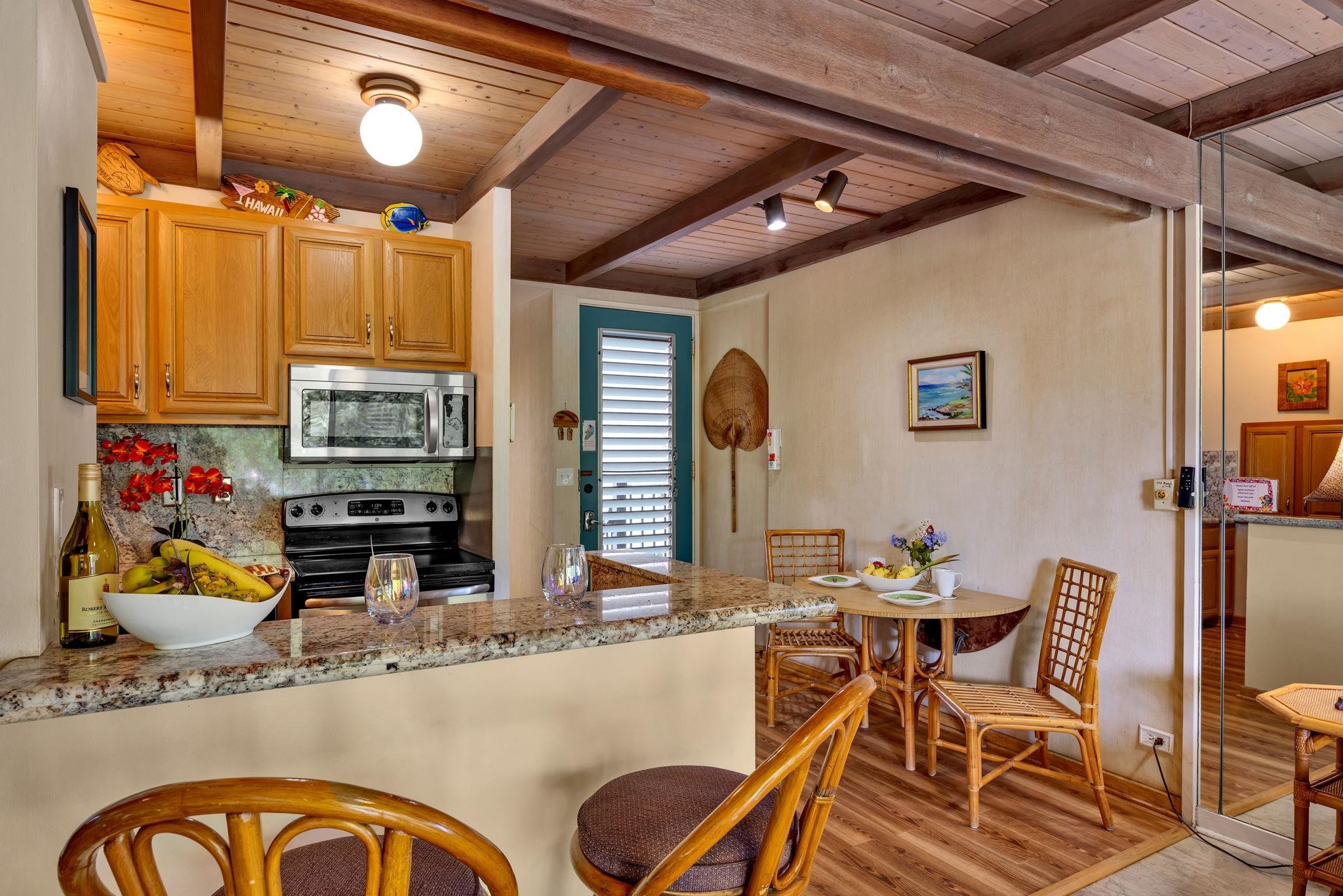 3691 Lower Honoapiilani Road, Unit 211 Lahaina, HI 96761 - Photo 8 of 47 a very nice looking dining room with furniture