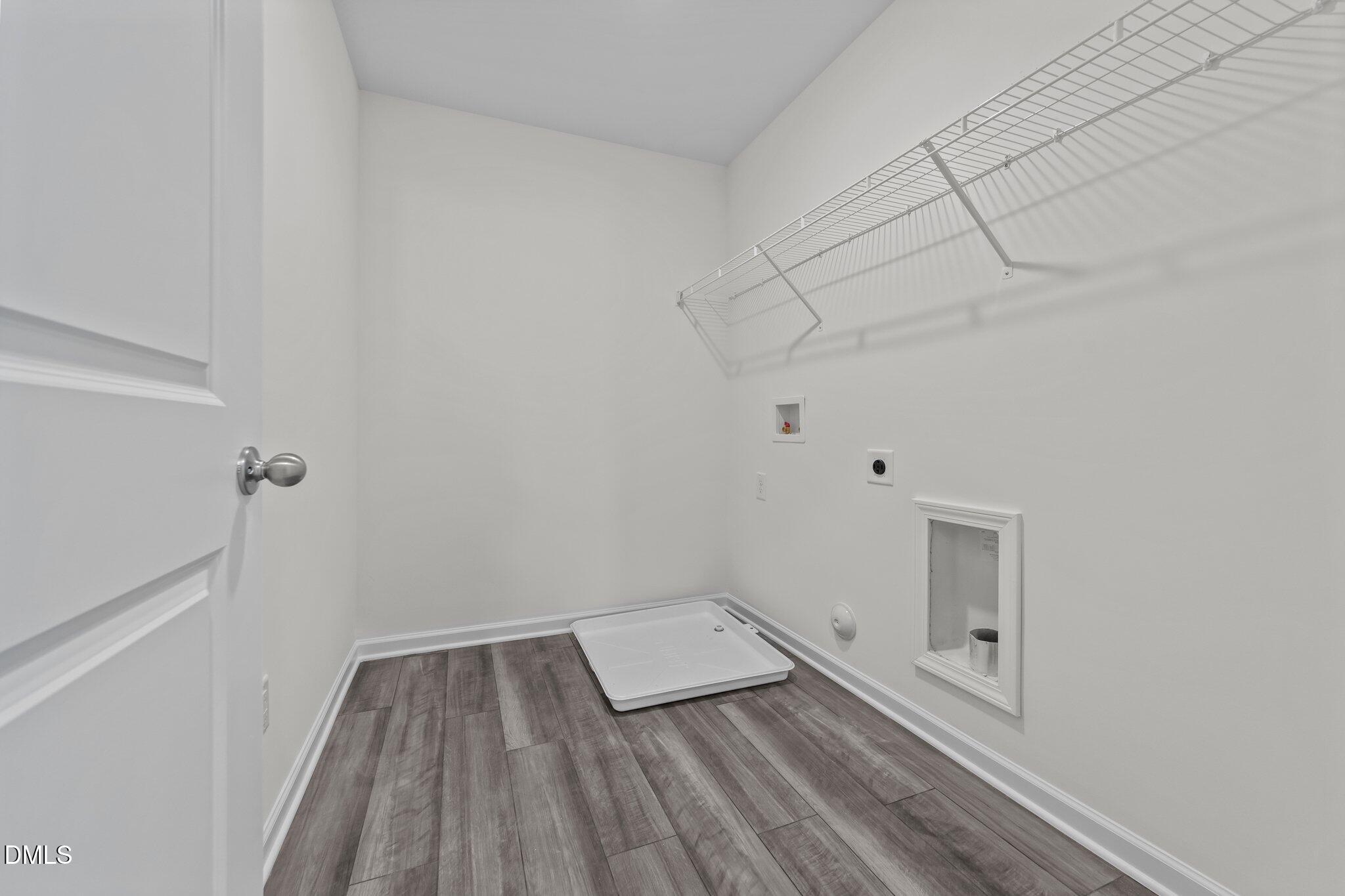 326 Shiloh Way Mebane, NC 27302 - Photo 25 of 34 a view of a room with an empty space and wooden floor