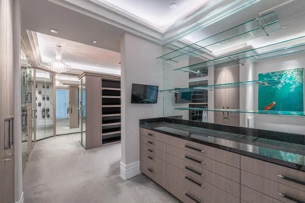 a kitchen with stainless steel appliances granite countertop a sink and cabinets