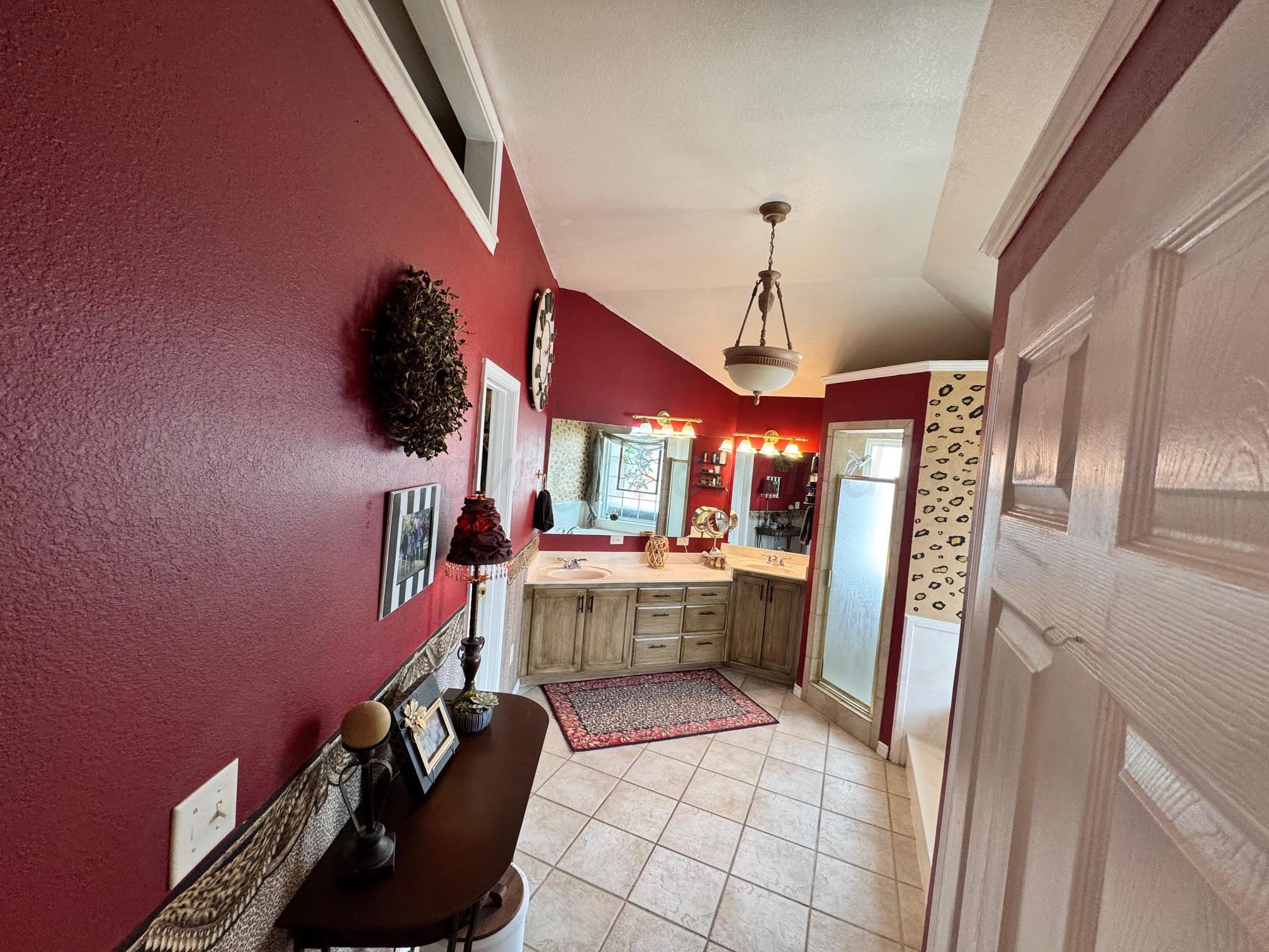 200 Hunters Trail Bushland, TX 79124 - Photo 13 of 23 a room with furniture and a chandelier