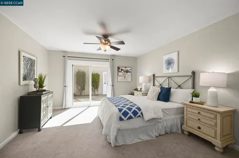 a bedroom with bed and window