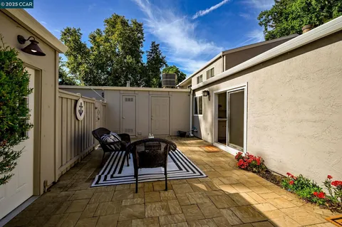 a view of a garage with wooden wall and floor