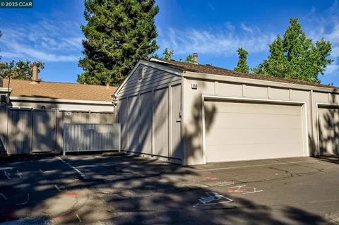 a view of outdoor space with wooden fence