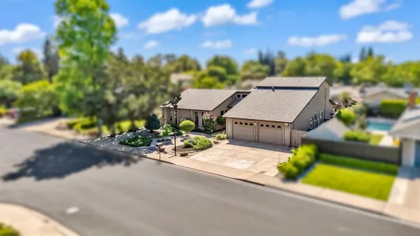 a view of a house with a street