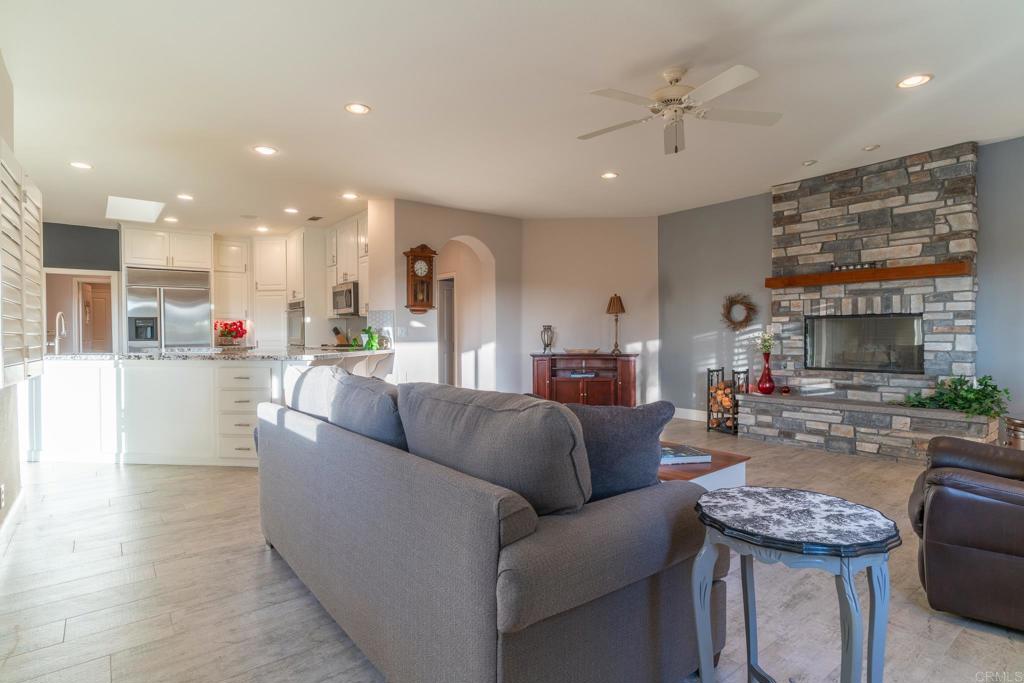 30646 Red Hawk Road Valley Center, CA 92082 - Photo 24 of 69 a living room with furniture and a fireplace
