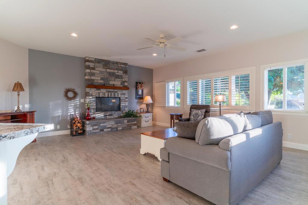 30646 Red Hawk Road Valley Center, CA 92082 - Photo 25 of 69 a living room with furniture and a fireplace