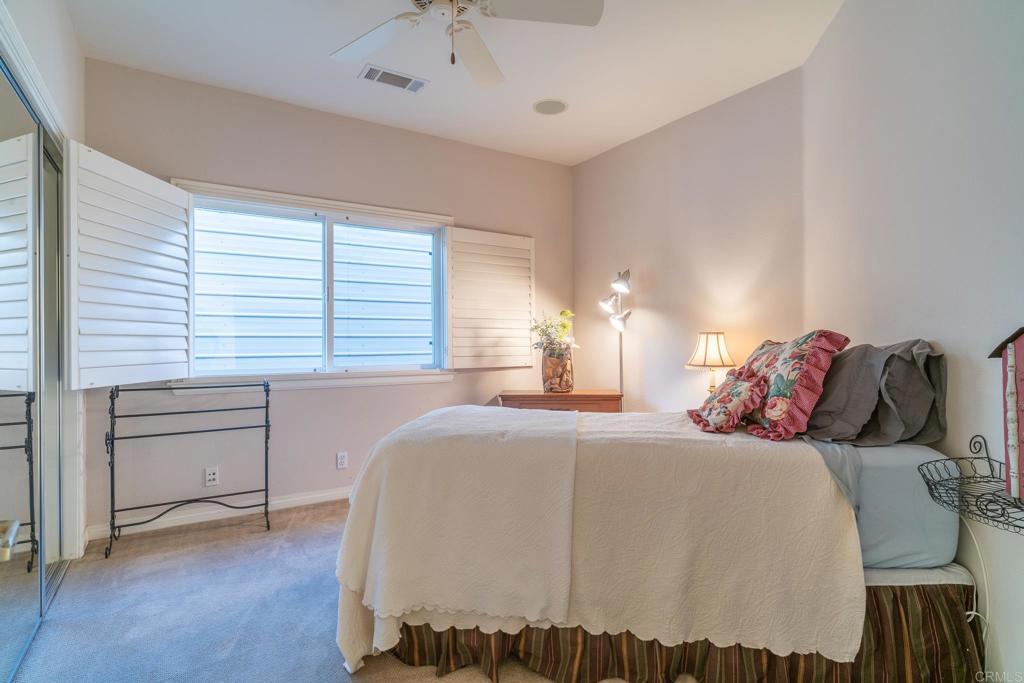 30646 Red Hawk Road Valley Center, CA 92082 - Photo 46 of 69 a bedroom with a bed and a dresser