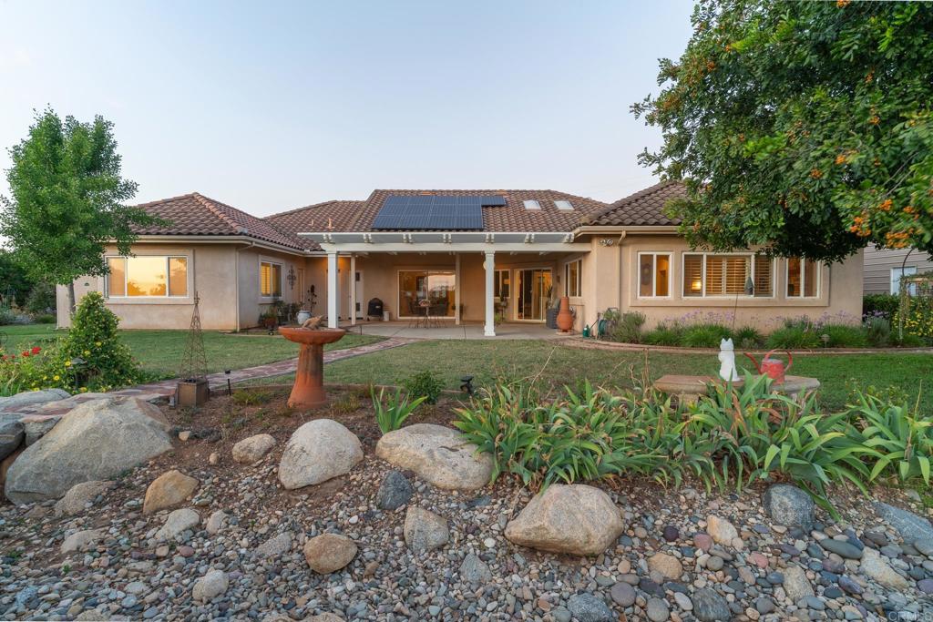 30646 Red Hawk Road Valley Center, CA 92082 - Photo 55 of 69 a front view of a house with a yard