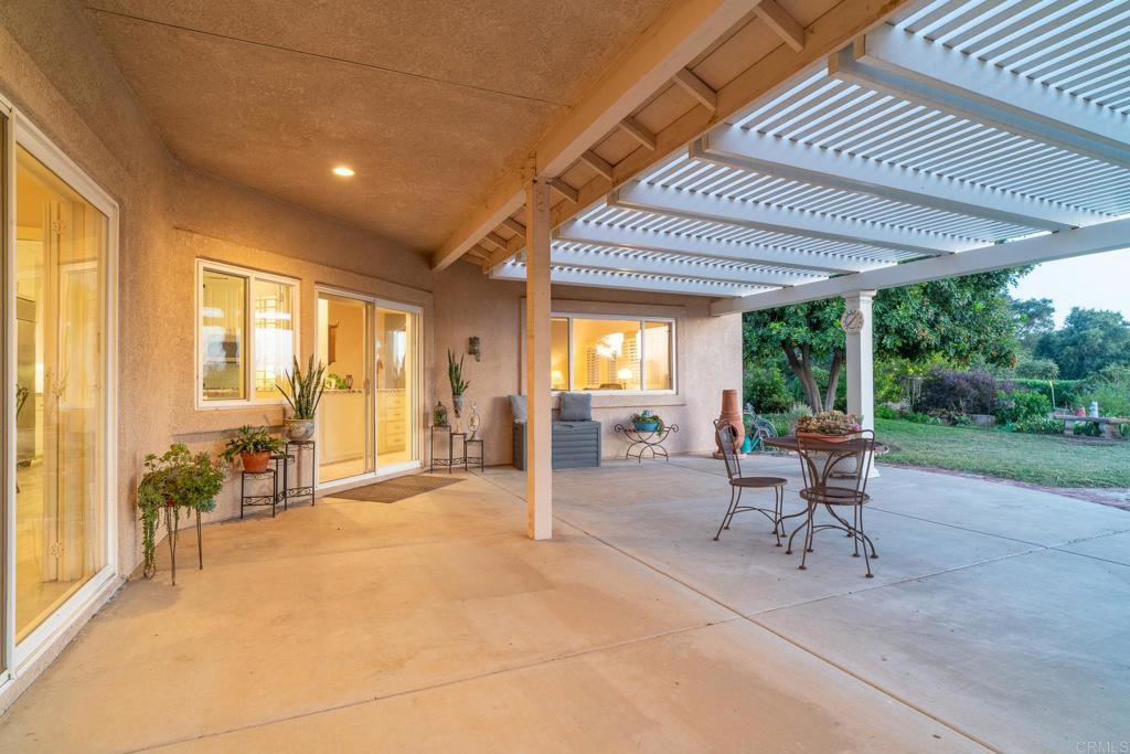 30646 Red Hawk Road Valley Center, CA 92082 - Photo 60 of 69 a living room with furniture and a large window