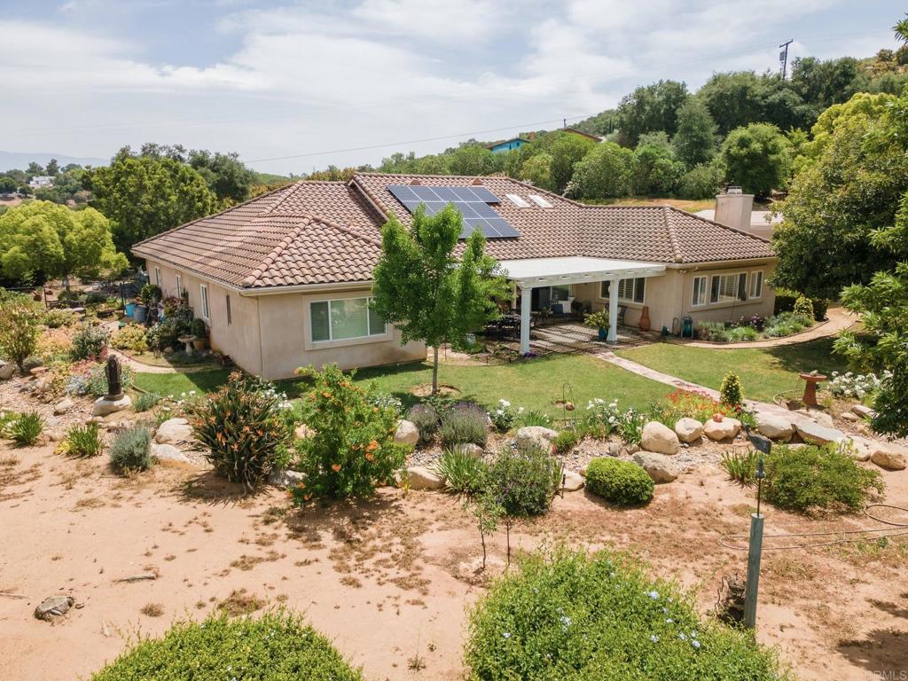 30646 Red Hawk Road Valley Center, CA 92082 - Photo 10 of 69 a front view of a house with a yard