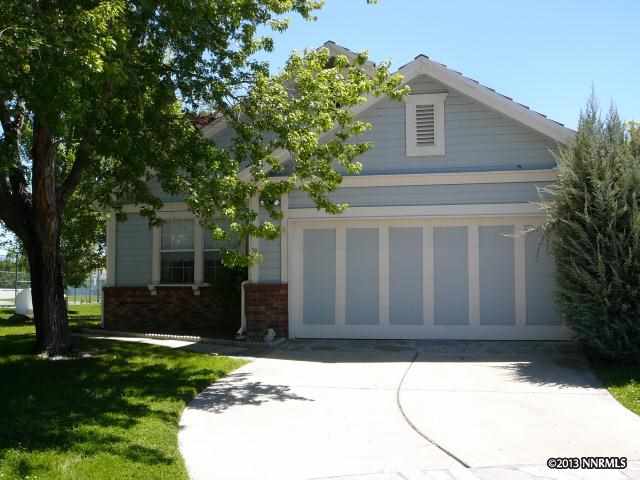 830 Blue Falls Place Reno, NV 89511 - Photo 1 of 1 a house with trees in front of it