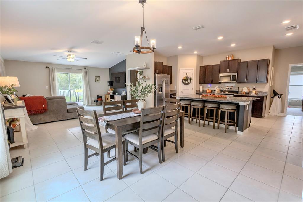 1628 Red Loop Lakeland, FL 33801 - Photo 15 of 37 a view of a dining area with furniture