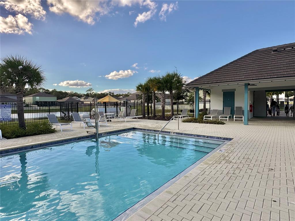 1628 Red Loop Lakeland, FL 33801 - Photo 2 of 37 a view of a swimming pool with a patio