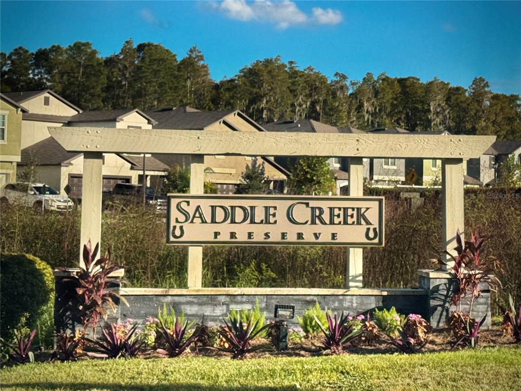 1628 Red Loop Lakeland, FL 33801 - Photo 37 of 37 a street sign on the side of building