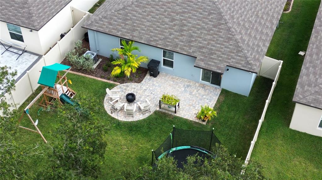 1628 Red Loop Lakeland, FL 33801 - Photo 6 of 37 an aerial view of a house with backyard swimming pool and outdoor seating