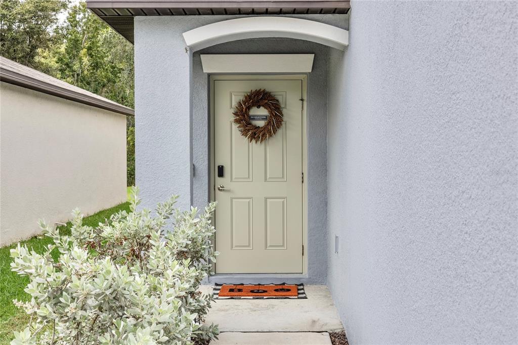 1628 Red Loop Lakeland, FL 33801 - Photo 8 of 37 a front view of a house with garage