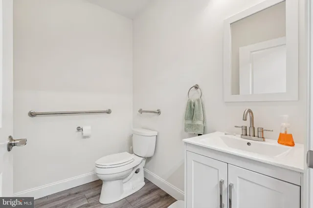 a view of a house with wooden floor fence and a porch