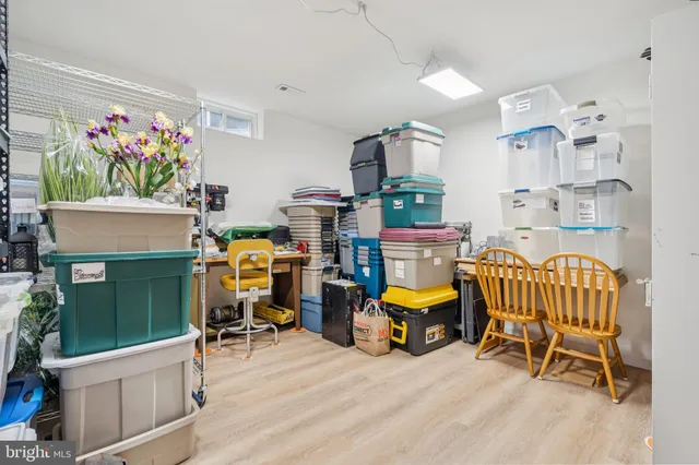 a sign that is sitting in front of a house