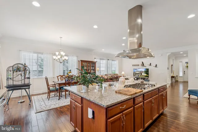 a kitchen with a table and chairs in it