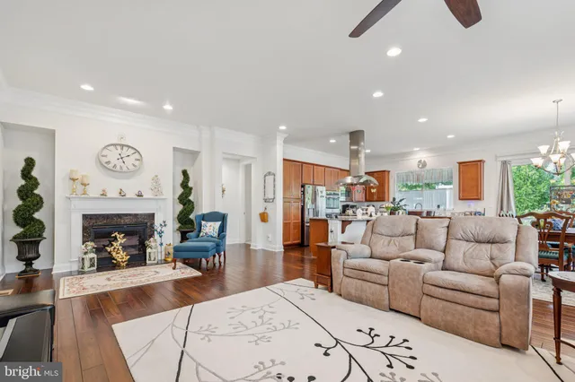 a bedroom with furniture and a flat screen tv