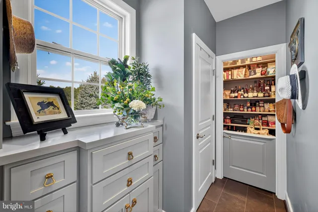 a view of cabinets and window