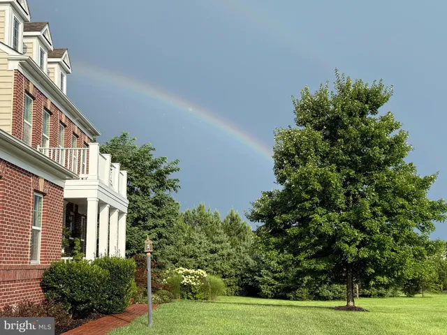 a view of a building with a yard