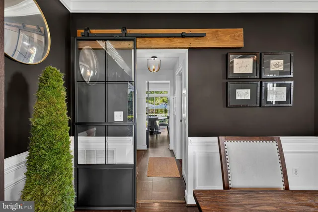 a front view of a house with a glass door