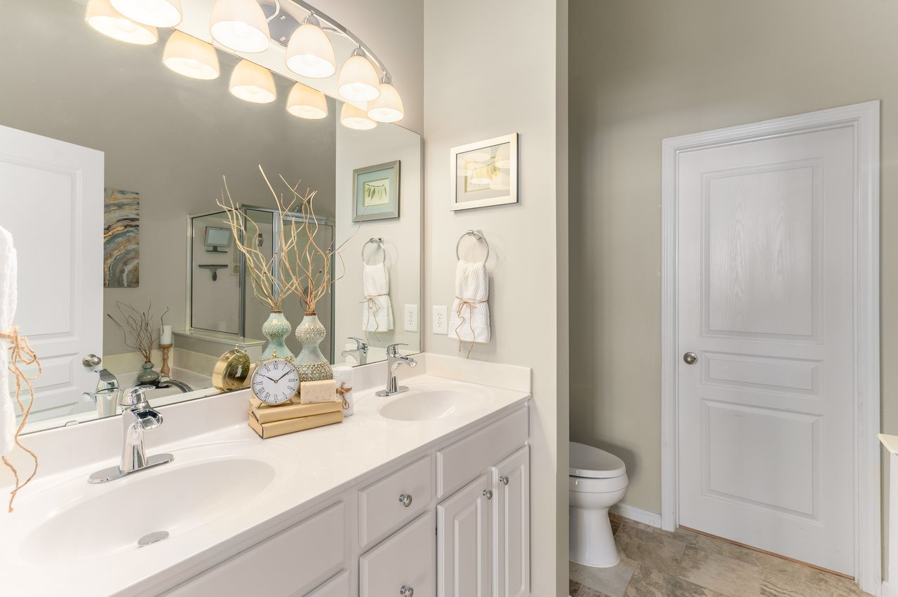 4925 Amber Clay Lane Raleigh, NC 27612 - Photo 5 of 11 GARDEN tub, SEPARATE shower, DUAL vanity and beautiful TILE flooring everything you would want in your bathroom! Owners Bath