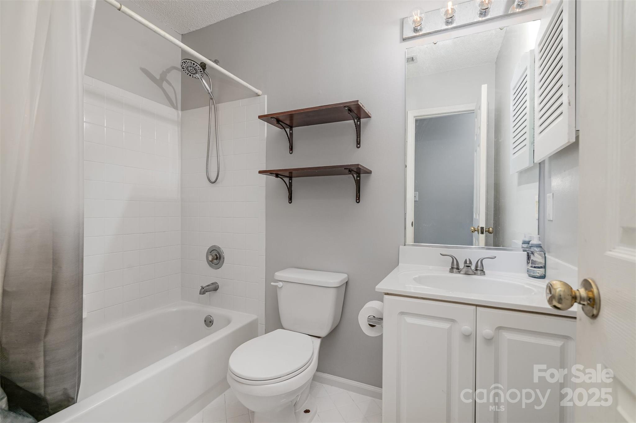 108 Shade Tree Circle Fort Mill, SC 29715 - Photo 21 of 36 a bathroom with a sink toilet and shower