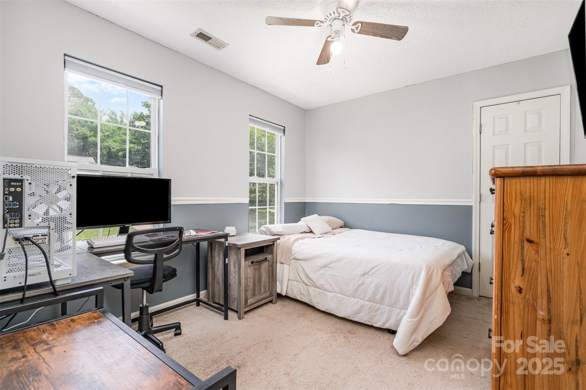 108 Shade Tree Circle Fort Mill, SC 29715 - Photo 22 of 36 a bedroom with a bed and a computer on the desk
