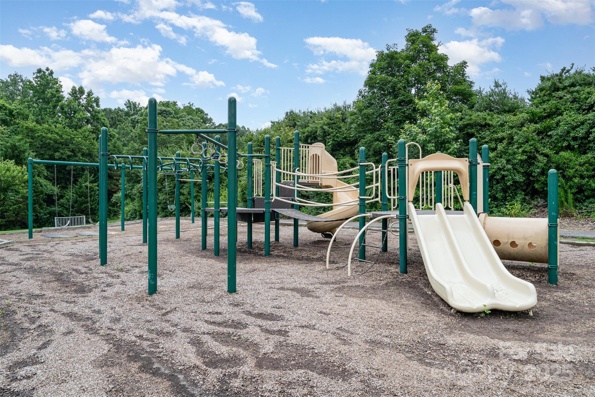 108 Shade Tree Circle Fort Mill, SC 29715 - Photo 28 of 36 a view of a bench in the backyard