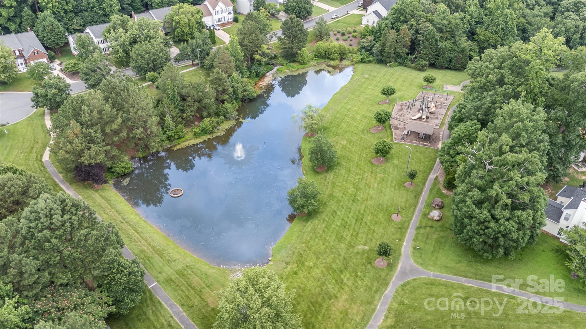 108 Shade Tree Circle Fort Mill, SC 29715 - Photo 31 of 36 an aerial view of a residential houses with outdoor space and trees all around