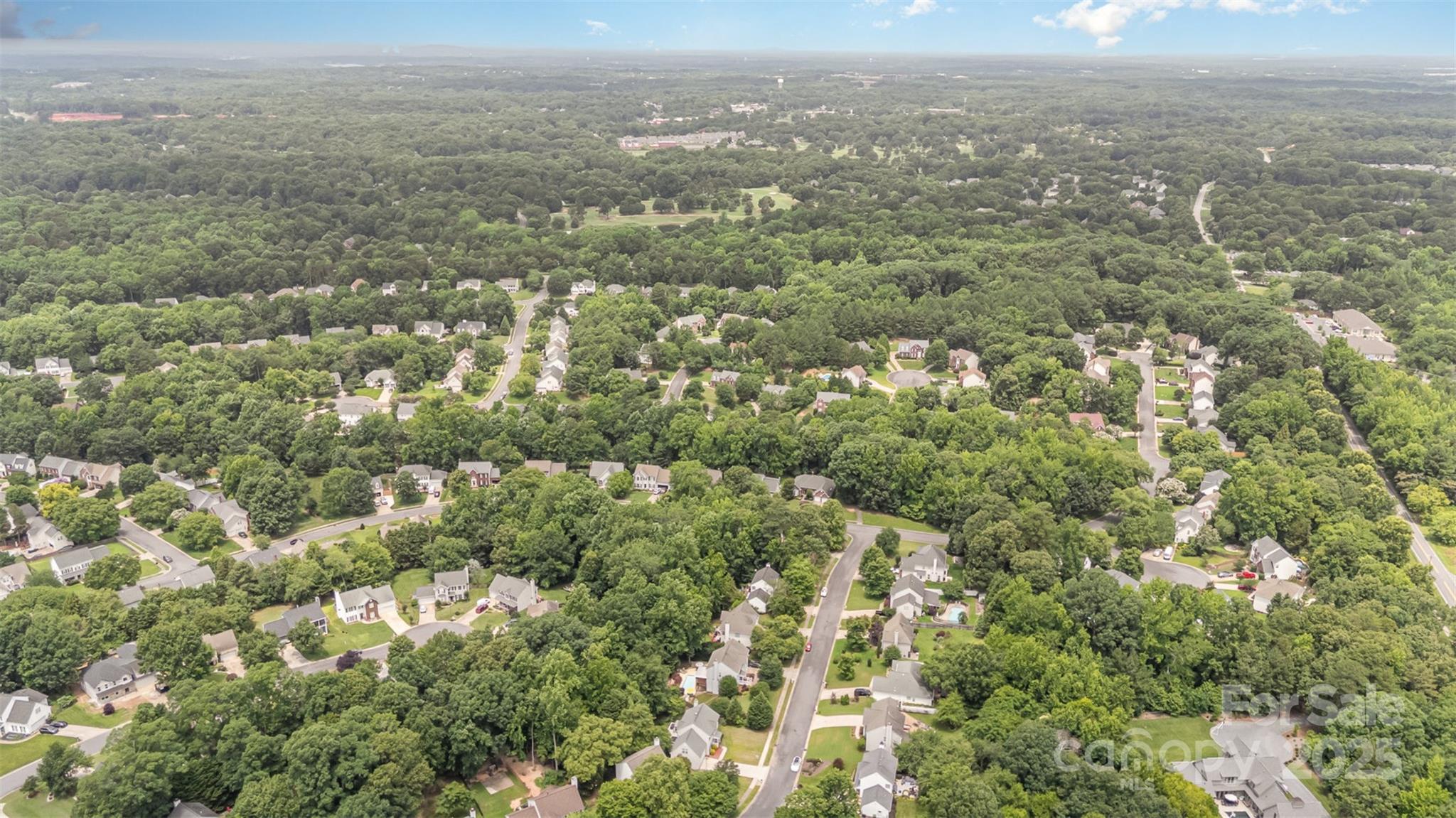 108 Shade Tree Circle Fort Mill, SC 29715 - Photo 32 of 36 an aerial view of residential houses with city view and tree