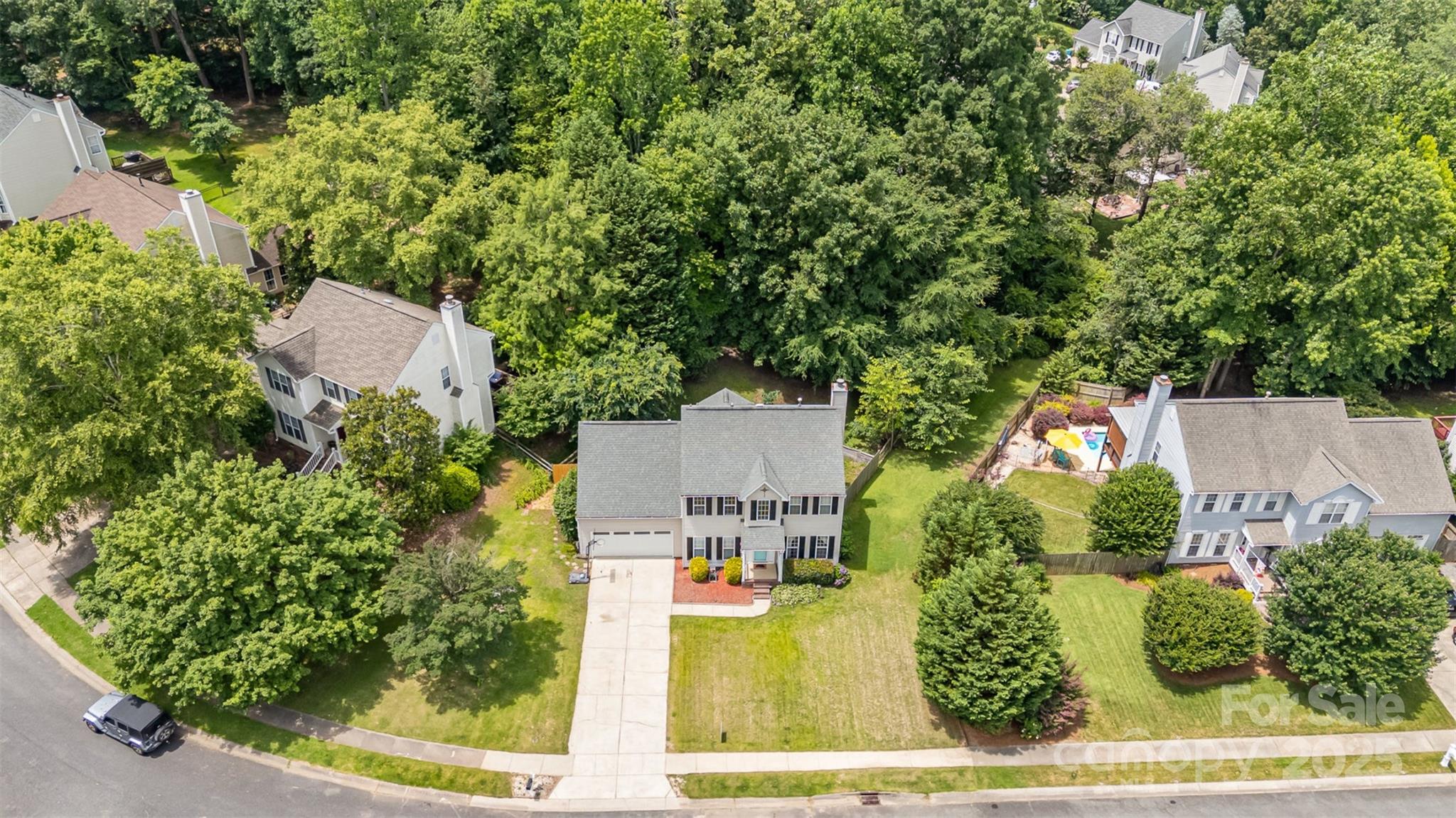 108 Shade Tree Circle Fort Mill, SC 29715 - Photo 33 of 36 an aerial view of a house with a yard and garden