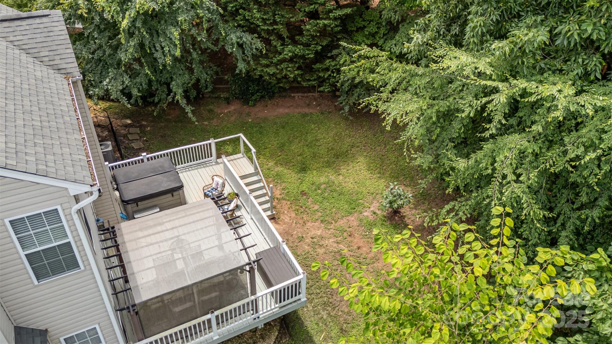 108 Shade Tree Circle Fort Mill, SC 29715 - Photo 35 of 36 a view of a lake with a house