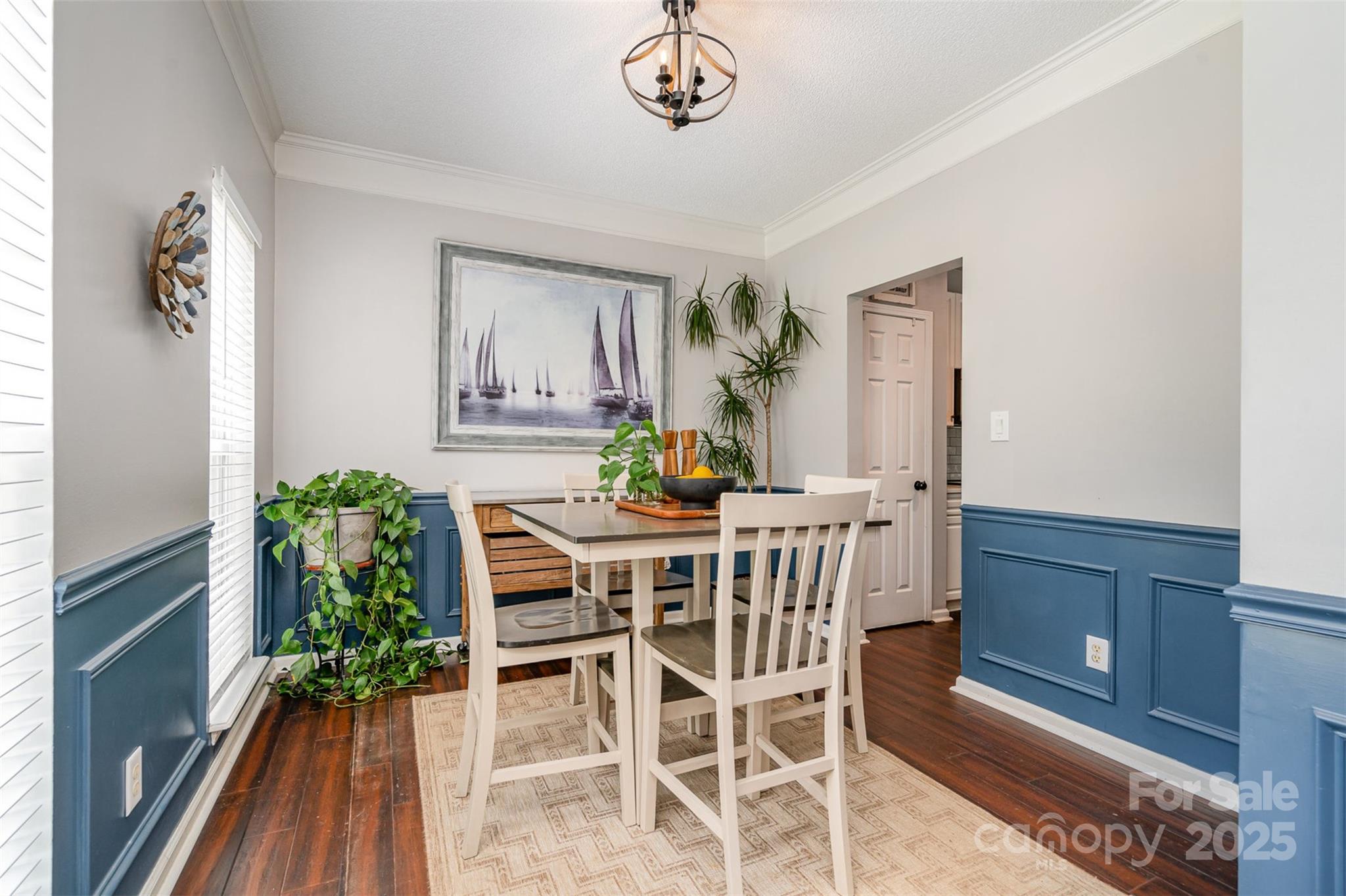 108 Shade Tree Circle Fort Mill, SC 29715 - Photo 7 of 36 a view of a dining room with furniture and wooden floor