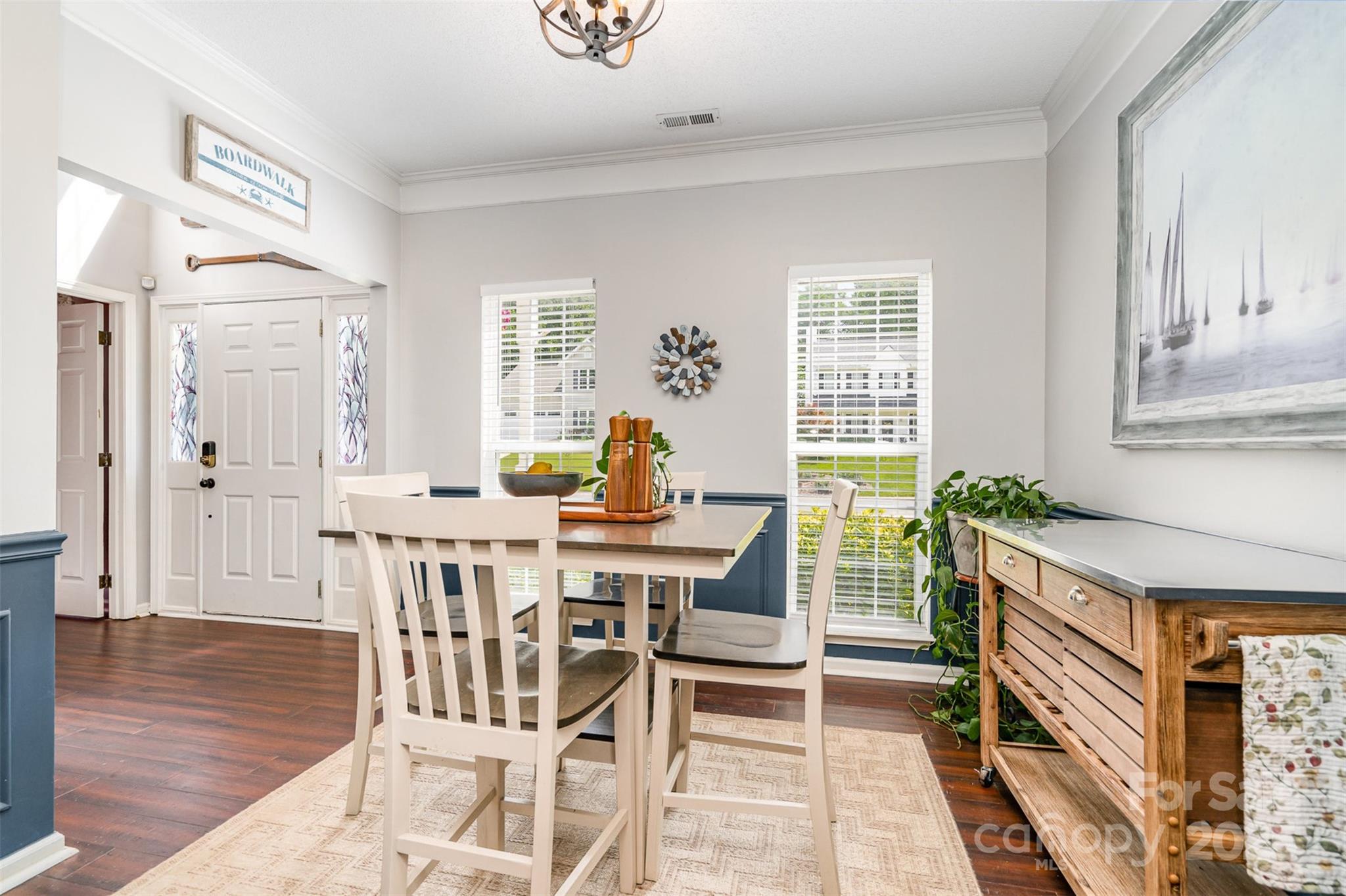 108 Shade Tree Circle Fort Mill, SC 29715 - Photo 8 of 36 a view of a dining room with furniture window and wooden floor
