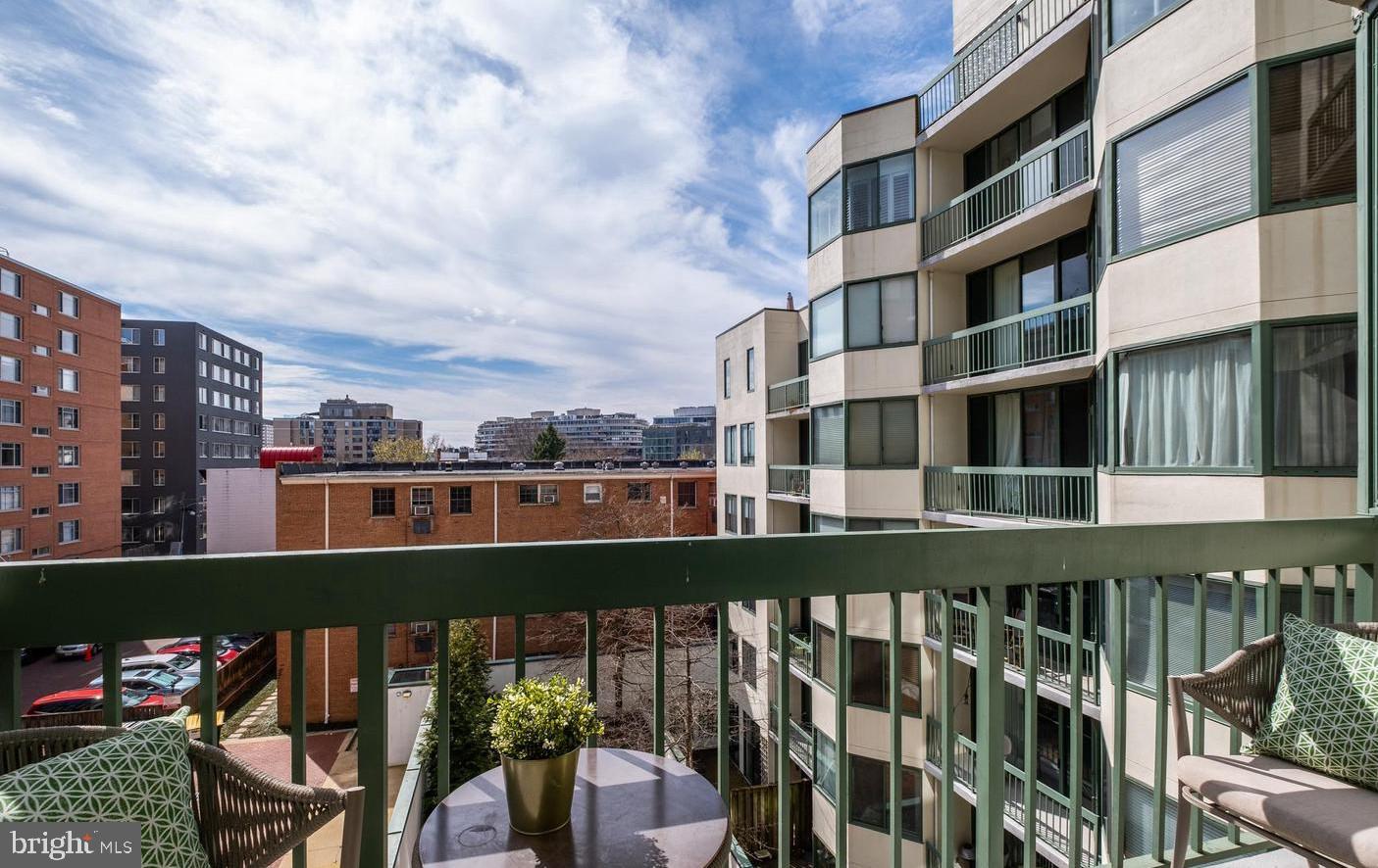 955 26th Street Northwest, Unit 506 Washington, DC 20037 - Photo 6 of 12 a city view from a balcony