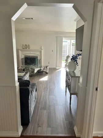 a view of a livingroom with furniture and a fireplace