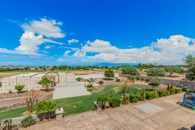 a view of a lake with a yard