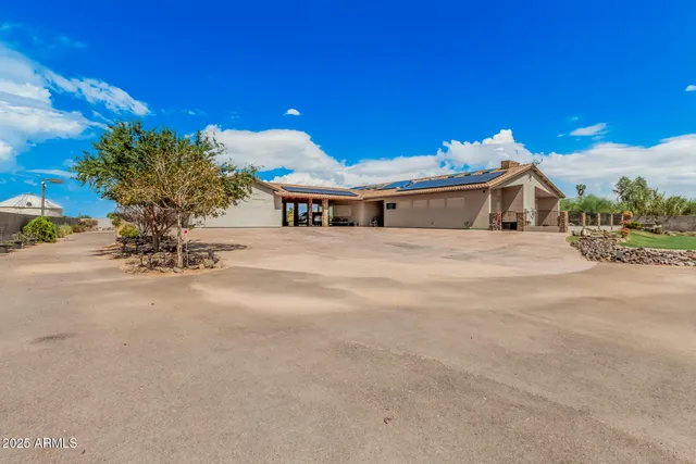 a view of a house with a street