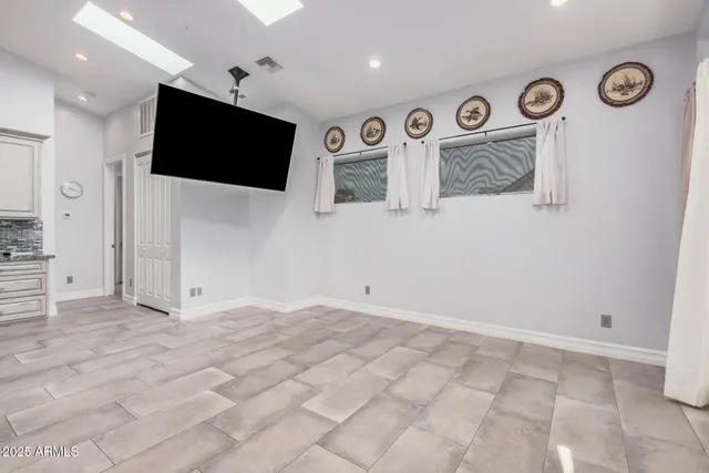 a view of a livingroom with a flat screen tv