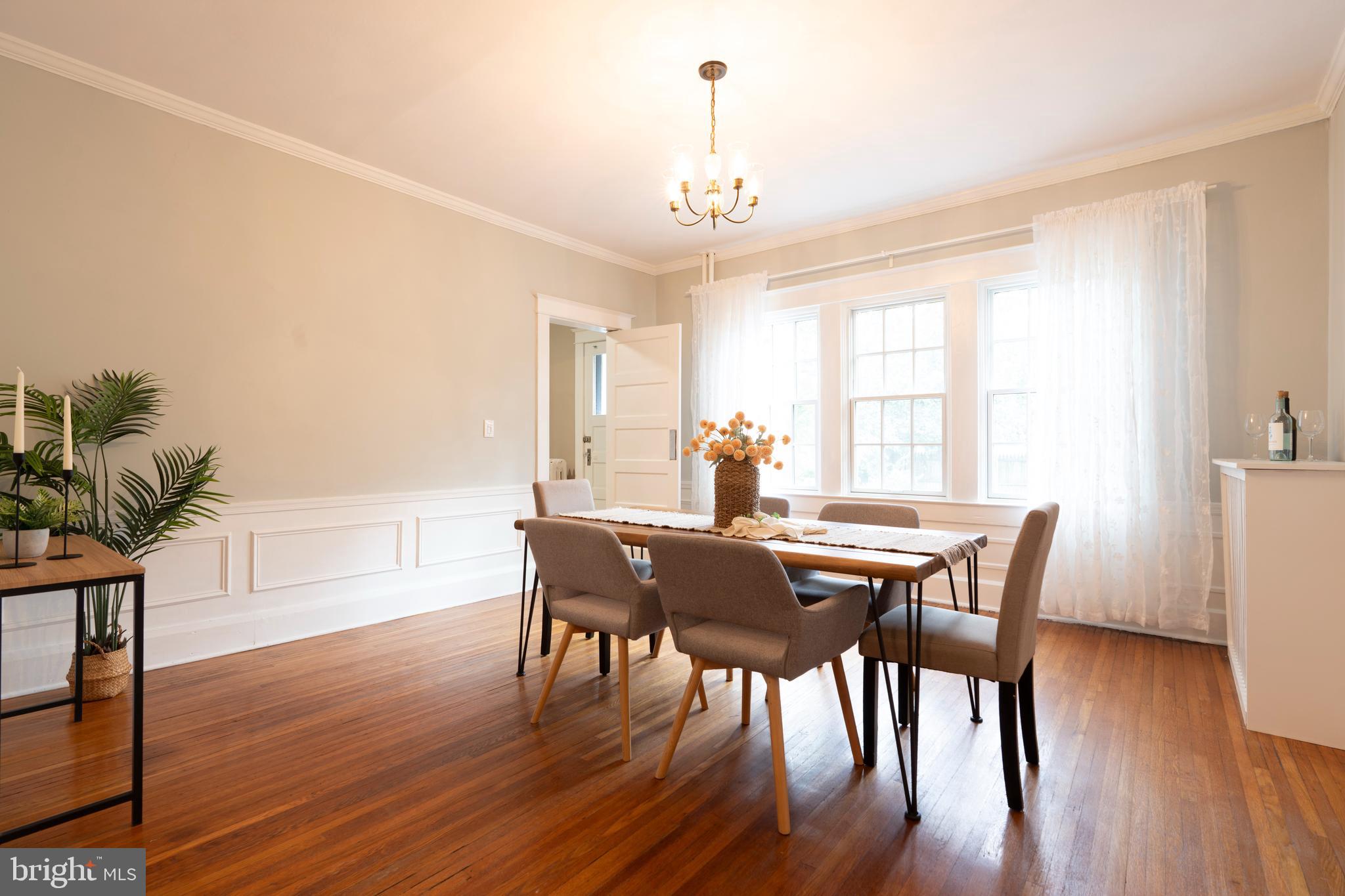 3541 Newland Road Baltimore, MD 21218 - Photo 13 of 68 a view of a dining room with furniture window and wooden floor