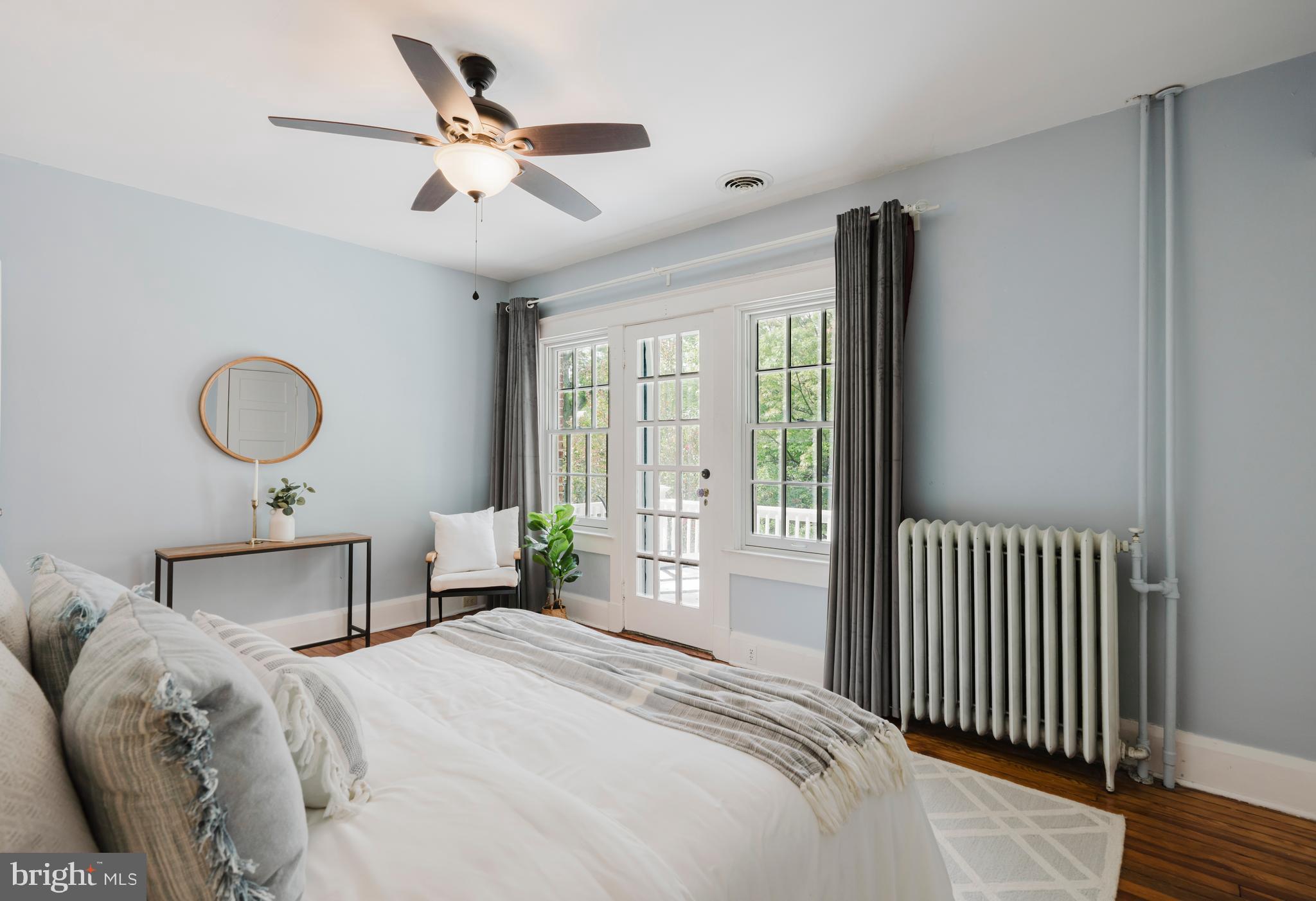 3541 Newland Road Baltimore, MD 21218 - Photo 26 of 68 a bedroom with a large bed and a large window