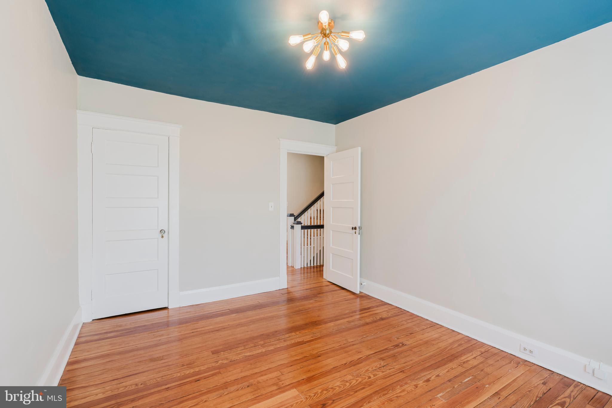 3541 Newland Road Baltimore, MD 21218 - Photo 36 of 68 a view of empty room with wooden floor