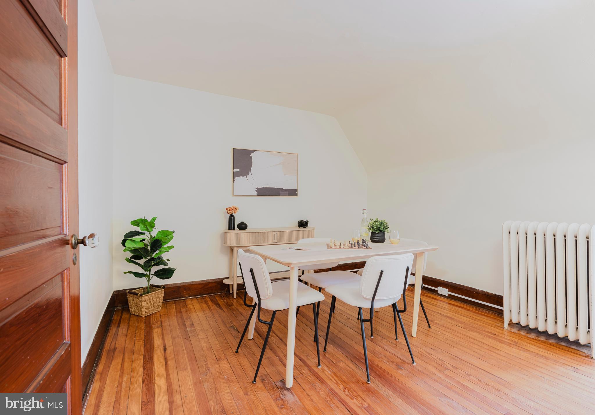 3541 Newland Road Baltimore, MD 21218 - Photo 41 of 68 a view of a dining room with furniture and wooden floor
