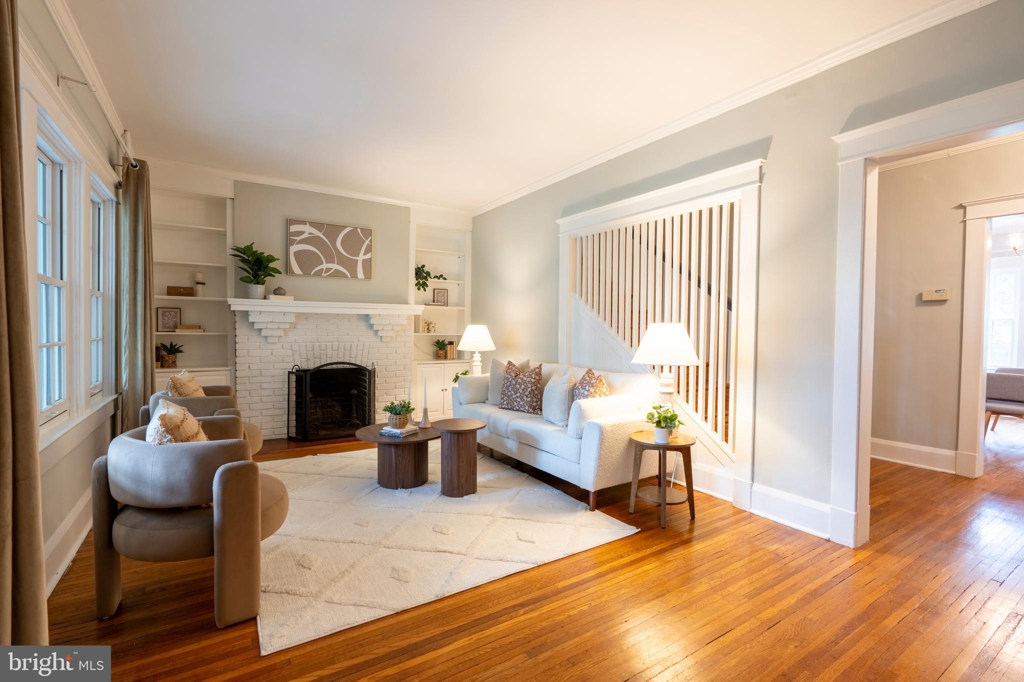 3541 Newland Road Baltimore, MD 21218 - Photo 6 of 68 a living room with furniture a fireplace and a table